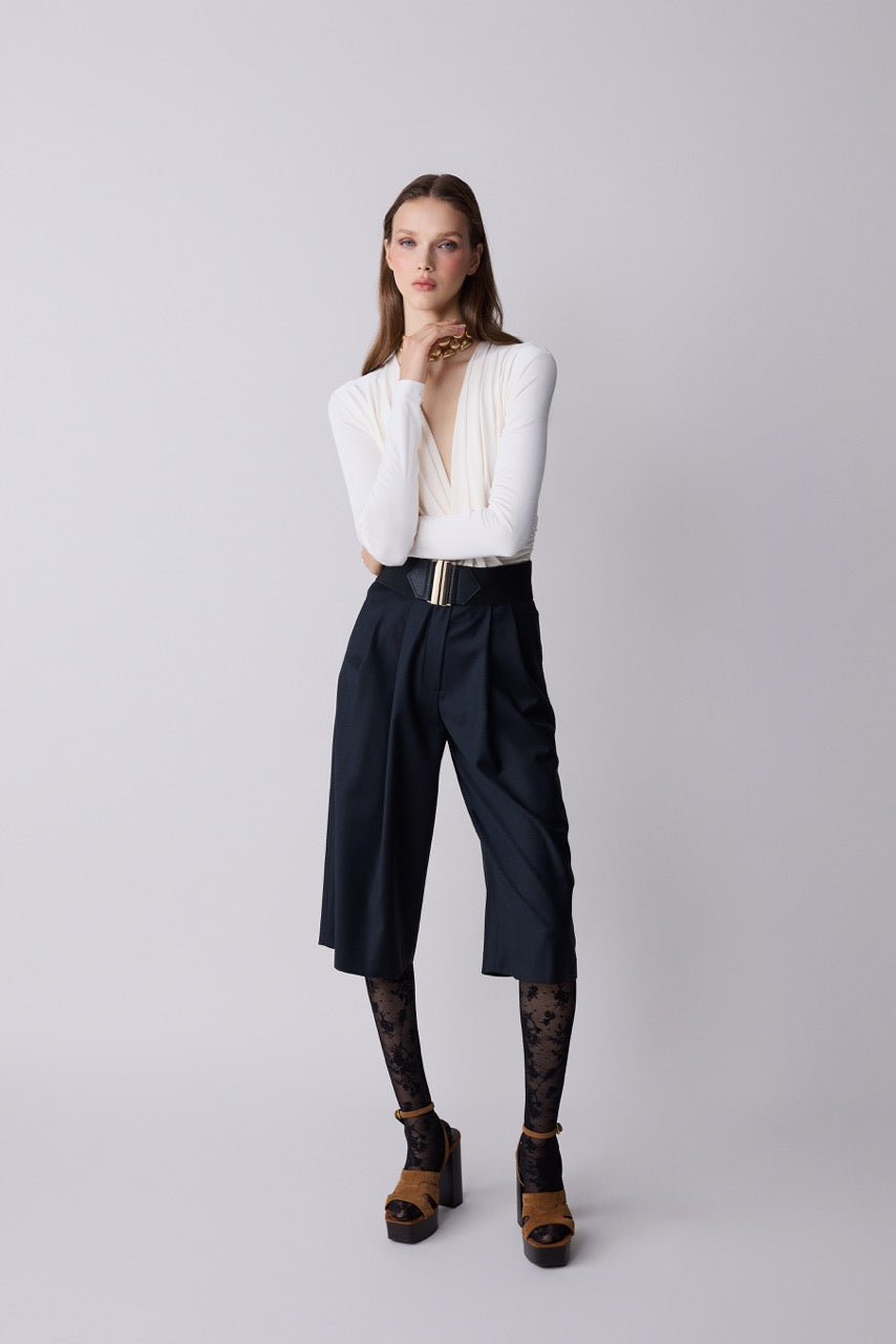 Basalt Black Wool Bermuda Shorts by Natalie Kolyozyan, Relief AW26